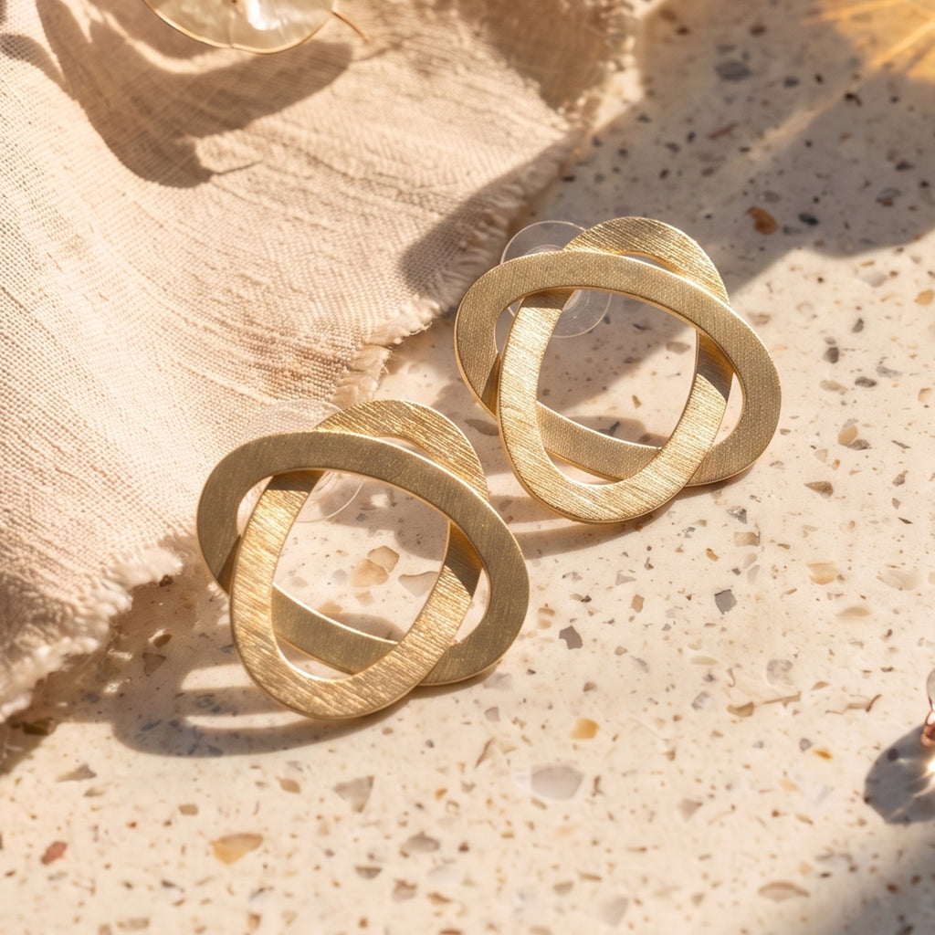 Interwoven Gold Statement Stud Earrings