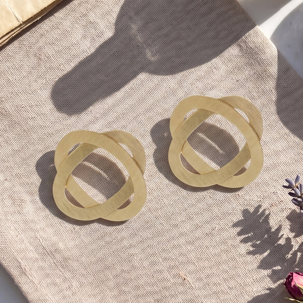Interwoven Gold Statement Stud Earrings
