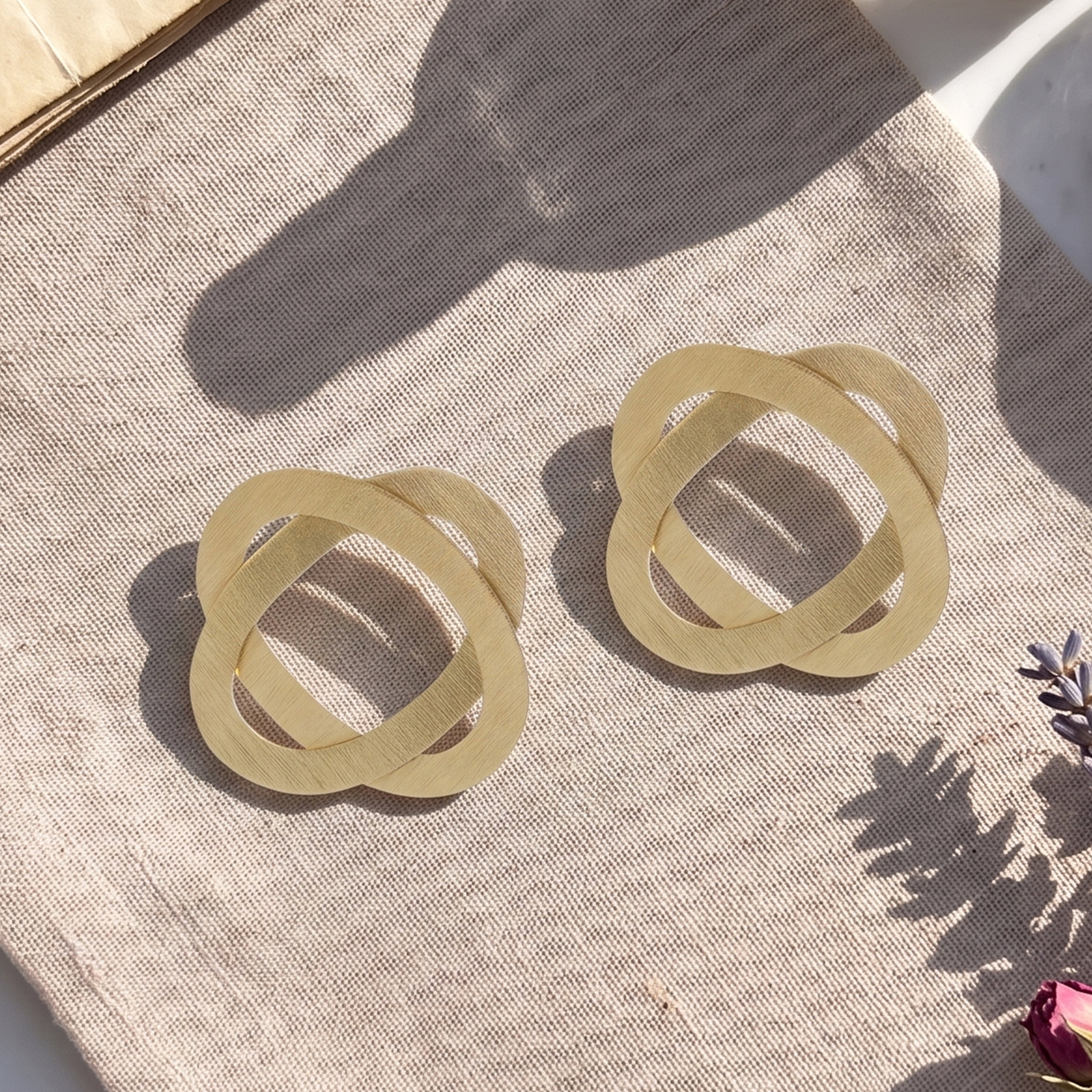 Interwoven Gold Statement Stud Earrings