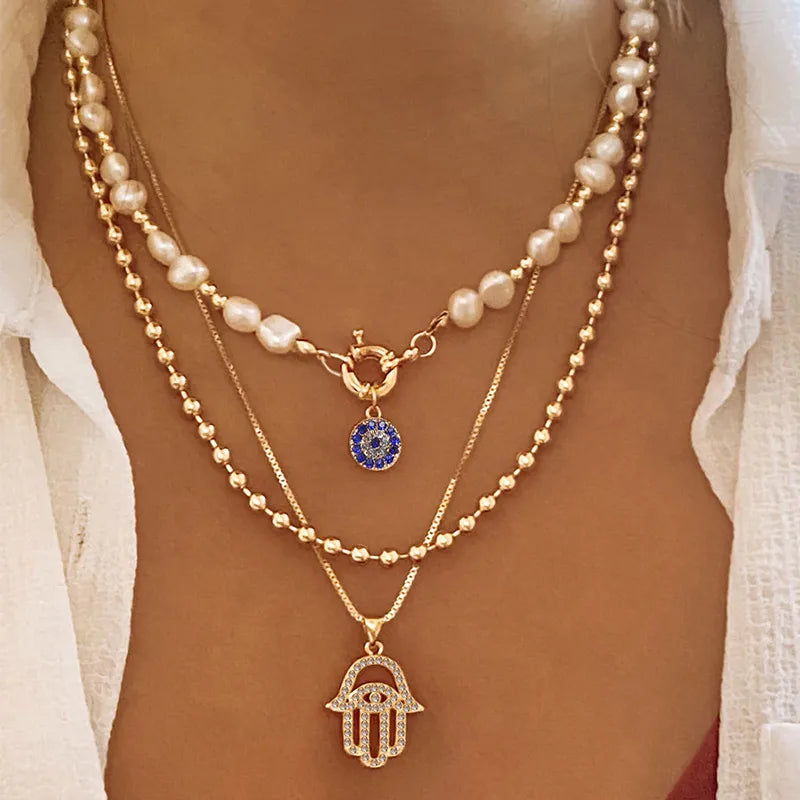 Gold Layered Hamsa Hand & Evil Eye Pearl Necklace Set